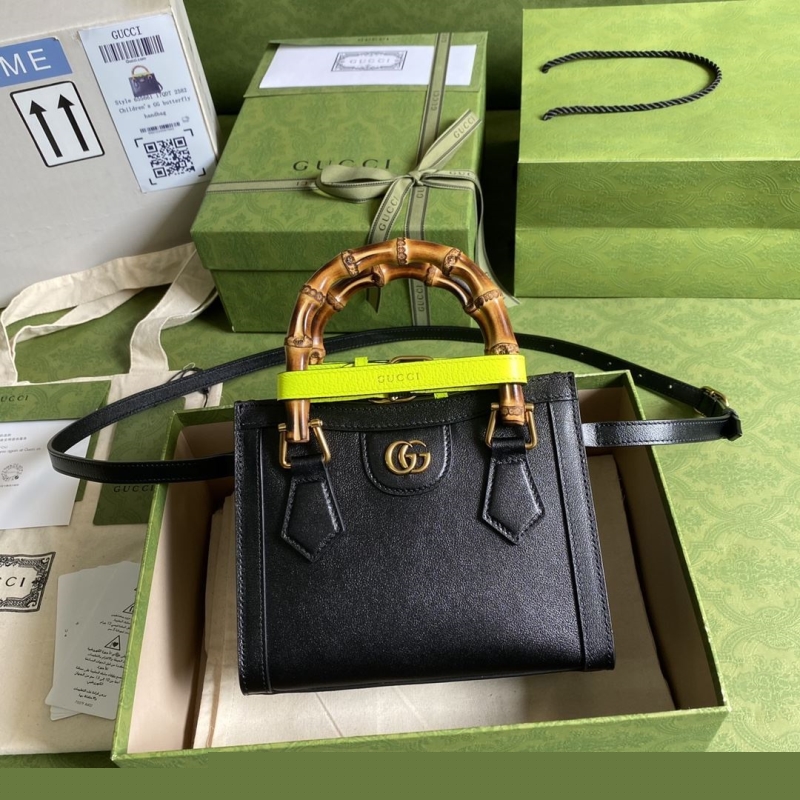 G*u*i top handle bags